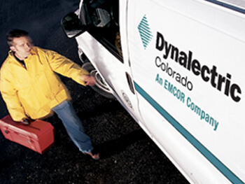 Dynalectric Colorado worker getting into a work van.
